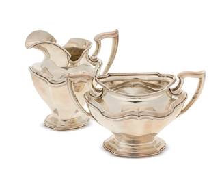 3013
A Reed & Barton sterling silver 'Hepplewhite Plain' creamer and open sugar
20th century
Each marked for Reed & Barton, sterling, and numbered: 560
Comprising two tea and coffee service items including a cream jug and an open sugar, monogrammed
2 pieces
Creamer: 5.75" H x 5.75" W x 3.625" D; Sugar: 4.5" H x 7.5" W x 4.125" D
Total weight: 22.3 oz. troy approximately
Estimate: $500 - $700