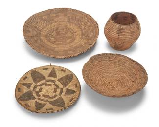 3273
A group of African baskets
20th century
Four works comprising three coiled basketry trays in various sizes and designs, including one with a star flower motif, and one with geometric banding, together with a tall coiled basketry jar with two bands of figural motifs including lizards
4 pieces
Largest tray: 2.75" H x 20.25" Dia.; Smallest: 3" H x 13.25" Dia.; Jar: 6.5" H x 8.5" Dia.
Estimate: $100 - $200