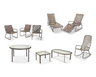 3356
An assembled suite of Brown Jordan 'Tamiami' and 'Lido' patio furniture
Mid/late 20th century
Each appears unmarked
Each brown powder-coated aluminum, comprising two 'Lido' armchairs (31" H x 21.25" W x 24.5" D), and one 'Tamiami' armchair (31" H x 23.25" W x 25.25" D), each with brown vinyl strapping, one 'Tamiami' circular patio table (25.5" H x 41.5" Dia.) and one square patio side table (14.75" H x 20.5" W x 20.5" D), each with inset Aqualite glass, one 'Lido' adjustable lounge chair (fully reclined: 14.75" H x 80" W x 24.25" D), one 'Tamiami' pivot lounge chair (37.25" H x 25.5" W x 58" D), one 'Tamiami' rocking chair (43" H x 21.75" W x 37" D), and an associated oval coffee table (15.5" H x 44.75" W x 24.5" D)
9 pieces
Estimate: $600 - $800