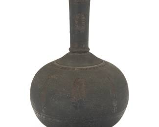 3321
An Indian Bidiri bronze vase
18th/19th century
Underside with older cataloguing label
With inset bands of silver foliate accents
11.125" H x 7" Dia.
Estimate: $300 - $500