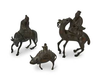 3252
Three East Asian bronze figural censers
Qing Dynasty (1644-1912) or later
Each likely Chinese, comprising one in the form of a sage on a horse, another depicting a sage on a goat, and the third in the form of a boy on a water buffalo
3 pieces
Largest: 6.875" H x 4.5" W x 2.25" D; Smallest: 3.5" H x 3.75" W x 2" D
Estimate: $500 - $700