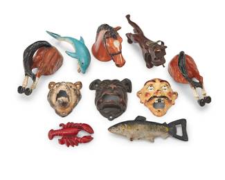 3344
A group of enameled cast iron figural bottle openers
Early/mid-20th century
Horses marked in the casting: Rubal / New York
Comprising three wall-mounted masks, three hand-held sea animals, three horse-form, and one carved wood Scottish Terrier dog corkscrew
10 pieces
Each mask: 4" H x 3.75" W approx.; Fish: 6.25" L
Estimate: $200 - $400