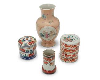 3249
A group of Asian polychrome porcelain items
20th century
Vase bearing an apocryphal reign mark for Qianlong Period (1735-1796)
Comprising a Famille Rose baluster-form vase depicting figural scenes in friezes, two cylindrical stacking boxes, and a small brush pot
4 pieces
Vase: 8" H x 4.75" Dia.; Brush pot: 3.625" H x 2.375" Dia.; Taller box: 4.125" H x 3.25" Dia.
Estimate: $200 - $300