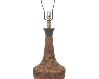 3292
A Modern cork and wood table lamp
Mid-20th century
Vasiform single-light lamp, electrified
Without harp: 24.375" H x 10.25" Dia.
Estimate: $100 - $150