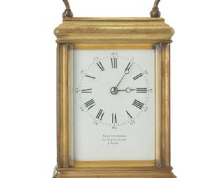 3042
A French gilt-brass carriage clock
Late 19th century, Retailed by Klaftenberger, London & Paris
Marked to dial: Klaftenberger / 157 Regent Street / & Paris; marked again to movement: Klaftenberger / Paris
The two-movement clock with enameled dial bearing Roman numerals to inner track and Arabic five-minute interval markers to outer track, housed in a glazed brass case with swing handle
Handle stored: 5.25" H x 3.5" W x 3.125" D
Estimate: $300 - $500