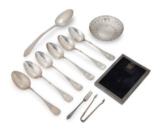 3005
A group of Tiffany & Co. sterling silver table articles
Directorship of John C. Moore II (1907-1947)
Each marked for Tiffany & Co. and sterling; each variously numbered and marked: M
Comprising a picture frame no. 1764 (sight: 5.5" H x 3.625" W), a large serving spoon (11.375"), a pierced bowl no. 5088 (5.25" Dia.), a set of 6 tablespoons (8.375"), and a small fork (4.75"), monogrammed
11 pieces
Total weight: 27.9 oz. troy approximately
Estimate: $600 - $800