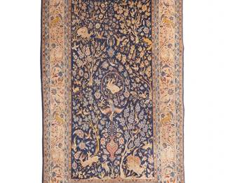 3070
A Qom 'Tree of Life' rug
Mid/late 20th century; Iran
Signed or inscribed in the weaving, visible at underside
Wool on cotton foundation
7' 9" L x 5' 1.5" W
Estimate: $300 - $500