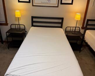 Three twin beds with mattresses and mattress cover.