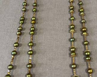 2 Necklaces Matching Earrings pierced