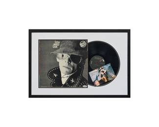 Signed Lou Reed Live album cover, framed with the vinyl record and a photograph