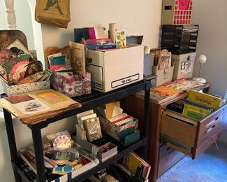 lots of vintage greetings cards and travel brochures