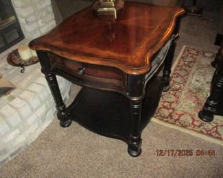 One of two matching end tables