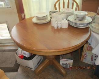 Dining table with one leaf and 4 chairs