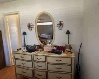 Second dresser with mirror, floral wall sconces. lamps