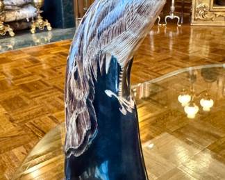 ($80- carved horn bird)