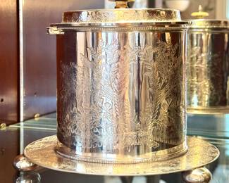 Silver plated biscuit box. $160.