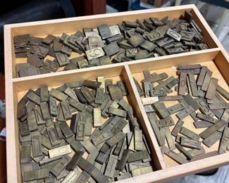 Antique brass printers type