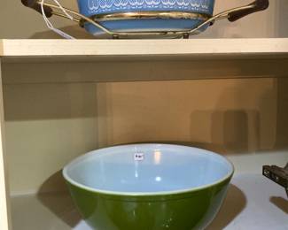 1965 Pyrex promotional "Blue Tulips" covered casserole in cradle, and dark green 1968 Pyrex #404 mixing bowl