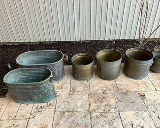 copper boilers, brass planters
