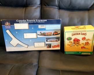  a Carole Towne Express train set and a Lincoln Logs Frontier Farm building set, both in their original boxes.
The Carole Towne Express is an electrically-operated, collectible Christmas village train set with a 24-inch diameter circular track. 
The Lincoln Logs set is part of the "Frontier Farm" collection. 
Both products are intended for creative play and display. 
Lincoln Logs Frontier Express 00981 | Knex.Parts
Lincoln Logs Frontier Express 00981.

knex.parts

Lemax Carole Towne Express Train Set 2003 Christmas ...
The Lemax Carole Towne Express Train Set from 2003 is a charming Christmas collectible featuring a 24" circle track. Made of plast...

eBay

Lemax 2006 Carole Towne Express Holiday Village Train Set w
Detailed information on Lemax 2006 Carole Towne Express Holiday Village Train Set w/ 24” Circular Track. The Lemax 2006 Carole Tow...

loqumgrill.com

Show all
