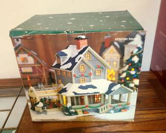 This is a Santas Workbench Briar Hill Manor Lighted Christmas Village House. 