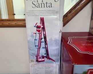 This is a Mr. Christmas Stepping Santa animated musical decoration. This festive item features: 
An animated Santa figure that climbs up and down a ladder.
Santa carries a string of LED lights.
Plays 15 different Christmas carols.
The ladder can be attached to a Christmas tree with an included clamp or leaned against a wall.
The product is powered by an AC adapter.
43 in. Animated Ladder Climbing Sculpted White Santa
Santa carries a string of LED lights. 9" wide x 7.5" deep x 43" tall ladder. AC adapter operated ( 9vDC 1200mA included) Share. Sh...

Mr. Christmas

43 in. Animated Ladder Climbing Sculpted Black Santa – Mr ...
Always stepping, never tiring, Super Climbing Santa will be a cherished part of your holiday decorations for years to come. * Ani...

Mr. Christmas

Amazon.com: Mr. Christmas Super Climber Musical Animated ...
Christmas is ready to climb into your heart this holiday season. A highly detailed figure in a real fabric outfit climbs up and do...


