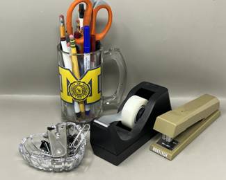 Lot 128 | Office Supplies U of M Beer Glass Stapler Tape
