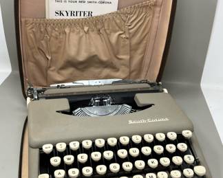 Lot 176 | Vintage Smith Corona Skyriter Portable Typewriter
