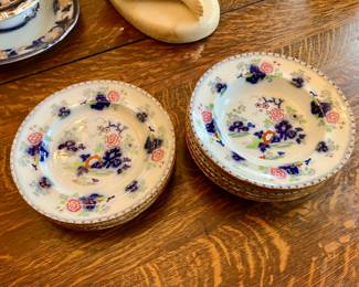 Set of 12 flow blue plates and soup bowls
$200