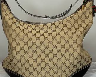 Gucci $1,200
Pre-owned
Canvas Leather
Pattern Gucci GG
Shoulder Strap
Hardware Gold Plated
Model Gucci Sherry
Origin Italy
Exterior Beige Lining Brown
Well Maintained
