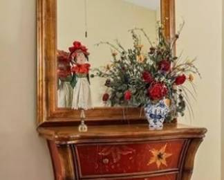 Dresser, Mirror and Floral arrangement