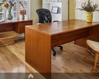 Desk and credenza, floral arrangements