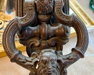 Antique ornate cast iron door knocker
