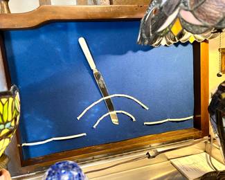 Lid opens and has ribbons to hold bar utensils