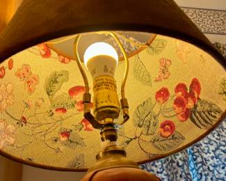 Leather base lamp w/a floral design on the inside of a suede shade