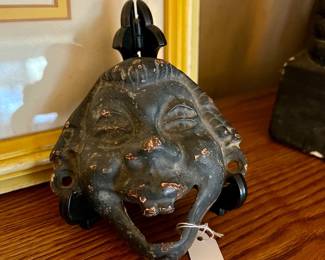 Vtg. Cast iron bottle opener