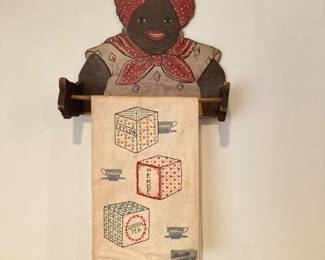 Hand decorated towels and old towel rack