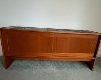 P7 - $100. Gangso Mobler Teak & Slate Credenza. Needs repair - one handle is broken. Generally needs tightened up. Measures 66.5" wide x 17.75" deep x 30" tall.