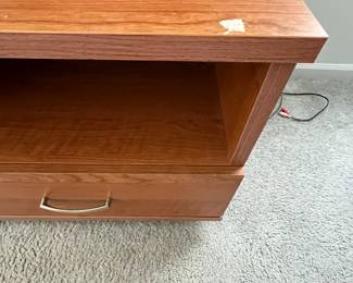 P27 - $10. Media Cabinet. Measures 49" x 21" deep x 21.5" tall. Pressed wood but in good condition!