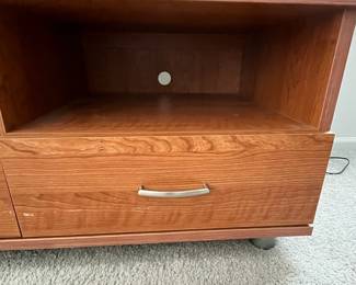 P27 - $10. Media Cabinet. Measures 49" x 21" deep x 21.5" tall. Pressed wood but in good condition!