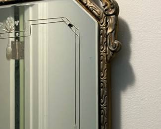 P44 - $75. Antique Wall Mirror by Boston Mirror Co. Measures 17" x 35" tall.