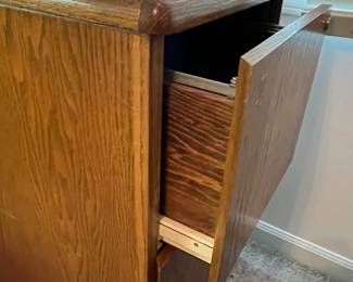 P38 - $20. Oversized wooden filing cabinet. No keys. Measures 16" wide x 36" deep x 29" tall. Built to look like a console table from the side.