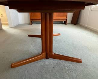 P4 - $275. Table Only! Edward Valentinsen. Drylund Dining Table. Has 2 leaves that store inside/under the table when not in use. Measures 41" wide x 63" long x 27.5" tall. Each leaf adds 18.75". One leaf has minor surface damage and one ring on the top where it looks like a plant was left.