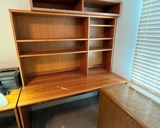 P40 - $20. Office Desk. Measures 58" wide x 30" deep x 65" tall. Hutch does come off to move. Please bring help to move!