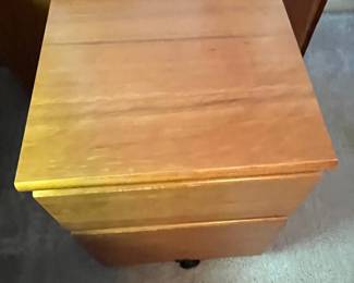 P39 - $10 Filing Cabinet. Measures 18" wide x 18" deep x 24" tall. Hanging files on the bottom single drawer on the top.