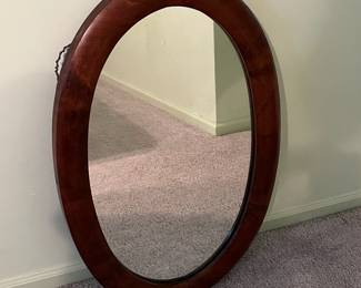P33 - $30. Wooden Framed Wall Mirror. Solid, heavy wood. Measures 20.5" x 32" tall.