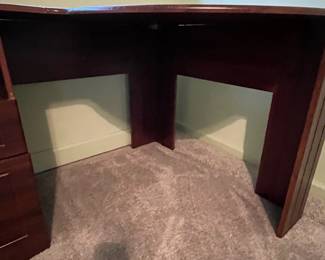 P31 - $30. Office Desk. In good condition and sturdy! Measures 58" long x 19.5" deep on one side and 39" deep on the larger side.