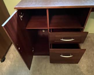 P31 - $30. Office Desk. In good condition and sturdy! Measures 58" long x 19.5" deep on one side and 39" deep on the larger side.