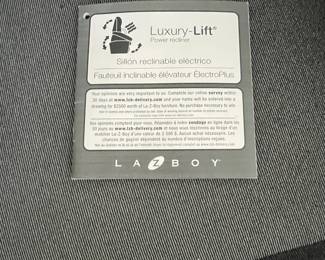 P23 - $250 Each - 2 Available. La-Z-Boy Luxury-Lift Power Recliner. 350# Limit. Measures 34" wide x 39" deep x 42" tall. Remote has lots of options! Lift, Recline, Back, Legrest, Headrest & Lumbar!