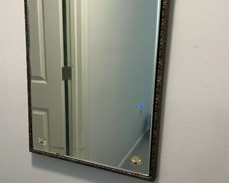 P44 - $75. Antique Wall Mirror by Boston Mirror Co. Measures 17" x 35" tall.